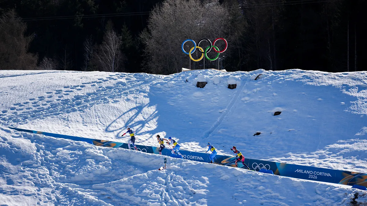 Медальний залік Олімпіади-2026 після 15 лютого: результати українців у біатлоні та гірськолижному спуску