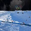Медальний залік Олімпіади-2026 після 15 лютого: результати українців у біатлоні та гірськолижному спуску