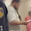 Майже дев’ять мільйонів збитків: правоохоронці викрили київський call-центр, який обманював іноземців