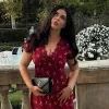 Декольте, шпильки та Yves Saint Laurent: Злата Мітчелл блиснула на італійському святі