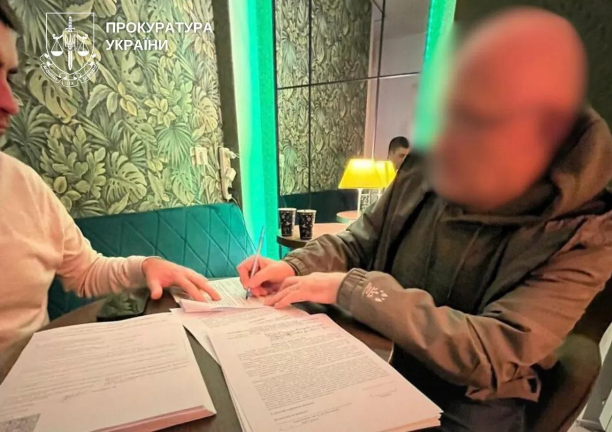 шахрай, київ, підозра