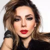 Не тільки косметика: Бажана показала, що у неї в сумочці – співачка носить воду, каву і навіть курятину