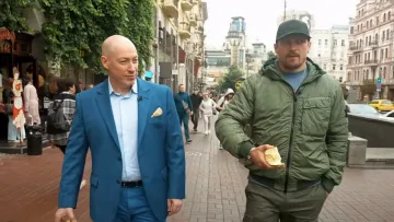 Київський таксист-туркмен покинув машину заради фото: Усик і Гордон оцінили вчинок