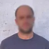 У Києві затримали чоловіка, який обкрадав квартири після нічного ракетного удару: подробиці від поліції