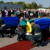 В Україну повернули прах лідера ОУН Андрія Мельника та його дружини: відео урочистої зустрічі труни на кордоні
