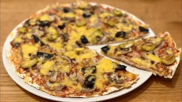 Проста піца на лаваші без духовки: низькокалорійний та смачний рецепт