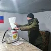 Озброєнні військові та силовики: відео, як в окупації проводять вибори до Держдуми РФ 