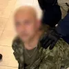 У Києві затримали чоловіка, який ходив по житловому комплексу з автоматом: що загрожує правопорушнику 